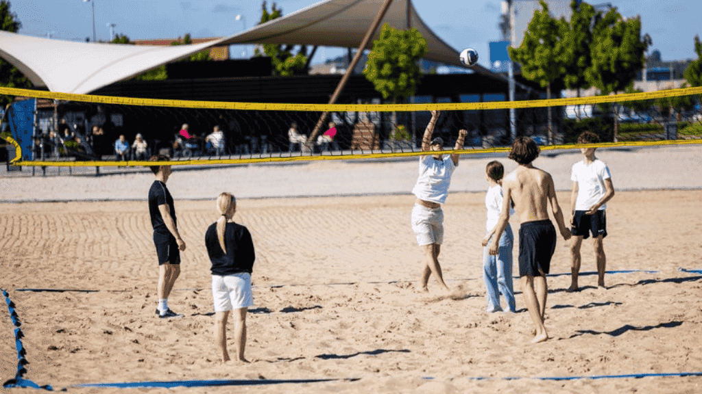 Young people play volley ball at Sønderstrand in Aabenraa